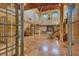 Grand foyer with soaring ceilings, travertine floors and a staircase leading to the upper level at 1136 N Lake Shore Dr, Sarasota, FL 34231