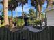 Backyard with a gazebo and tropical landscaping at 451 Avenida De Mayo, Sarasota, FL 34242