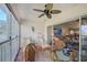 A view from the lanai through sliding glass doors to the home's interior at 4706 Sand Trap Street E Cir # 202, Bradenton, FL 34203