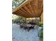 Outdoor patio area with dining table and pergola at 107 22Nd E St, Bradenton, FL 34208