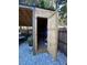 Outdoor storage shed with shelving and double doors at 107 22Nd E St, Bradenton, FL 34208