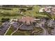 Aerial view of community clubhouse near golf course at 5301 Laurel Oak Ct, North Port, FL 34287