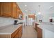 Well-equipped kitchen featuring ample cabinetry, granite countertops, and stainless steel appliances at 5301 Laurel Oak Ct, North Port, FL 34287
