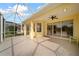 Enjoy the outdoors in this screened patio, featuring sliding doors to interior at 5301 Laurel Oak Ct, North Port, FL 34287