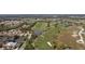 Home situated on a golf course with a lake nearby at 5301 Laurel Oak Ct, North Port, FL 34287