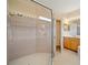 Large walk-in shower with glass enclosure and neutral tile at 5301 Laurel Oak Ct, North Port, FL 34287