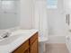 Clean bathroom with tub, shower, and vanity at 5301 Laurel Oak Ct, North Port, FL 34287