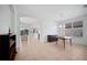 Open dining room with a view to the kitchen and living areas at 5301 Laurel Oak Ct, North Port, FL 34287