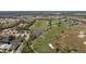 Aerial view of house near golf course and community at 5301 Laurel Oak Ct, North Port, FL 34287