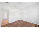 Bright bedroom with hardwood floors and double door closet at 5301 Laurel Oak Ct, North Port, FL 34287