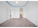 Spacious Primary bedroom with carpeting, access to bathroom and another room at 5301 Laurel Oak Ct, North Port, FL 34287