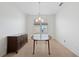 Bright dining room featuring a round table and buffet at 5301 Laurel Oak Ct, North Port, FL 34287