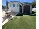 Fully fenced backyard with a storage shed and artificial turf at 4802 Brae Burn Ave, Sarasota, FL 34234