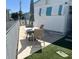 Backyard showing a patio dining set and artificial turf at 4802 Brae Burn Ave, Sarasota, FL 34234