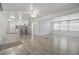A bright and airy living space featuring an open floor plan with an eat in kitchen, perfect for modern living at 4802 Brae Burn Ave, Sarasota, FL 34234