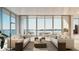 Spacious living room with water views at 223 Golden Gate Point # 8A, Sarasota, FL 34236