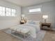A bedroom featuring a padded bench at the end of the bed and natural light at 3621 San Remo Ter, Sarasota, FL 34239
