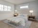 Bright bedroom with natural light, white bedding, and elegant decor for a serene and inviting space at 3621 San Remo Ter, Sarasota, FL 34239