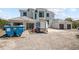 Front exterior showcasing the home under construction and surrounding landscaping at 3621 San Remo Ter, Sarasota, FL 34239