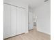 Bedroom with large closet and access to a bathroom at 23246 Stelling Ave, Port Charlotte, FL 33980