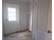 Laundry room with shelving and exterior access at 4772 Duncan Rd, Punta Gorda, FL 33982