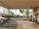 Well-equipped fitness center with city views at 223 Golden Gate Point # 9C, Sarasota, FL 34236