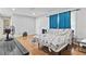 Comfortable bedroom with hardwood floors, ample natural light, and neutral walls at 301 Lambert St, Port Charlotte, FL 33948
