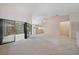 Bright living room with sliding glass doors to the balcony and open floor plan at 1654 Starling Dr # 201, Sarasota, FL 34231