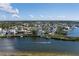 Wide view of waterfront homes and community at 1910 Oregon Trl, Englewood, FL 34224