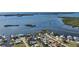 Aerial view showcasing waterfront homes and community at 1910 Oregon Trl, Englewood, FL 34224