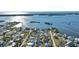 Aerial view of waterfront homes and canal system at 1910 Oregon Trl, Englewood, FL 34224