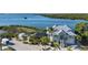 Waterfront home with private dock and lush landscaping at 1910 Oregon Trl, Englewood, FL 34224