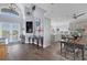 Bright dining room with hardwood floors and view to kitchen at 1910 Oregon Trl, Englewood, FL 34224
