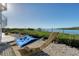 Relaxing hammock overlooking the water, near a spiral staircase at 1910 Oregon Trl, Englewood, FL 34224