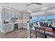 Modern kitchen with stainless steel appliances and marble countertops at 1910 Oregon Trl, Englewood, FL 34224