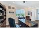 Home office features built-in shelving and a view at 1910 Oregon Trl, Englewood, FL 34224