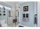 Large walk-in shower with glass enclosure and modern fixtures at 1910 Oregon Trl, Englewood, FL 34224