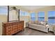 Lakefront sitting area with a sofa and dresser at 1910 Oregon Trl, Englewood, FL 34224