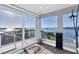 Relaxing sitting area with water views and sliding glass doors at 1910 Oregon Trl, Englewood, FL 34224