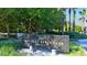 Private entrance to Bay Isles Beach Club community at 3040 Grand Bay Blvd # 283, Longboat Key, FL 34228