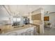 Modern kitchen with stainless steel appliances and island at 3040 Grand Bay Blvd # 283, Longboat Key, FL 34228