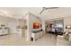 Spacious living room with views and access to dining area at 3040 Grand Bay Blvd # 283, Longboat Key, FL 34228