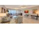 Elegant living room with water views and comfortable seating at 3040 Grand Bay Blvd # 283, Longboat Key, FL 34228
