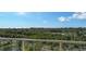 Panoramic view of lush landscape and ocean at 3040 Grand Bay Blvd # 283, Longboat Key, FL 34228