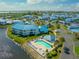 Aerial view of waterfront community featuring a pool and spa at 840 Audubon Dr # 840, Bradenton, FL 34209