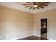 Primary bedroom with hardwood floors and ensuite bathroom at 326 Saint George Ct # 14, Venice, FL 34293