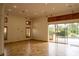 Bright living room with pool and patio view at 326 Saint George Ct # 14, Venice, FL 34293