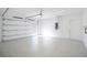 Bright and spacious garage with epoxy flooring and an automatic garage door at 2111 Hawthorne St, Sarasota, FL 34239