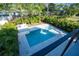 Aerial view of the luxurious pool and surrounding landscape at 2111 Hawthorne St, Sarasota, FL 34239