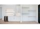 Modern wet bar with floating shelves and wine cooler at 2111 Hawthorne St, Sarasota, FL 34239